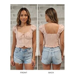 Hollister pink cotton eyelet crop top.